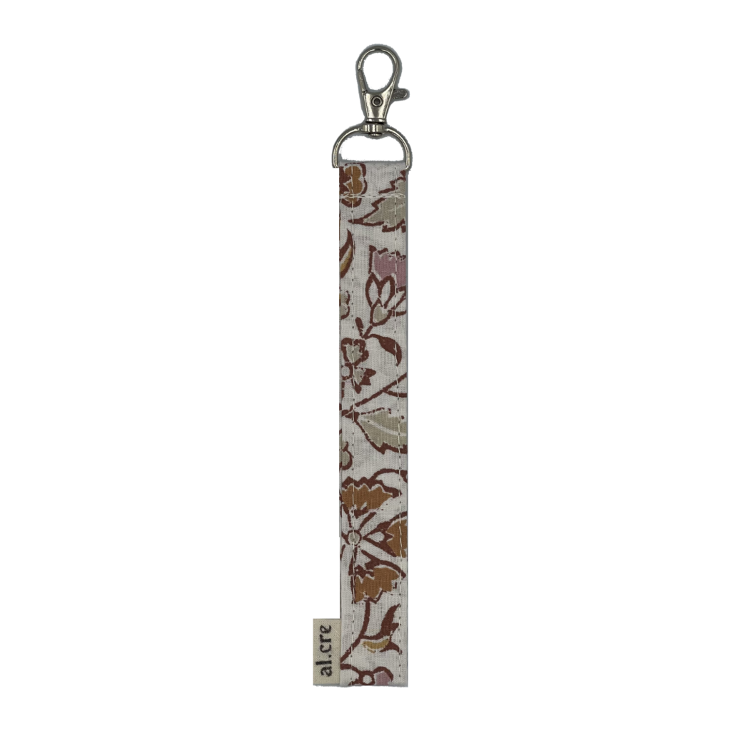 pale floral wrist keychain